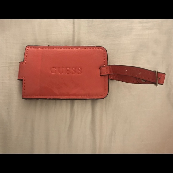 guess luggage tag